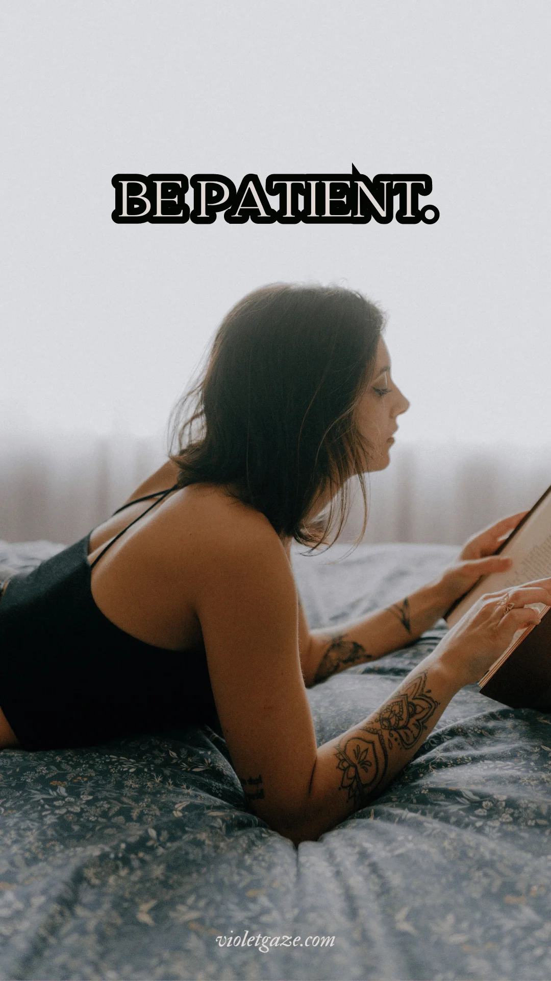 image of a woman reading a book on a bed with the text be patient above her head